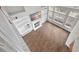 Living room boasting hardwood floors, fireplace, tall windows, and built in shelves at 106 Brandy Ct, Summerville, SC 29485