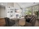Cozy living room with vaulted ceilings, built in bookshelves, and fireplace at 106 Brandy Ct, Summerville, SC 29485