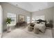Relaxing main bedroom showcasing a trey ceiling, two windows and neutral decor at 106 Brandy Ct, Summerville, SC 29485