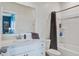 Clean bathroom featuring a white vanity with countertop, a toilet, and a shower-tub combo at 111 Medford St, Summerville, SC 29486
