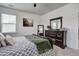 Well-lit bedroom showcasing a dark wood dresser, nightstands, and carpet floors at 111 Medford St, Summerville, SC 29486