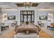 Stylish common area with elegant decor, hardwood floors, and plenty of natural light at 111 Medford St, Summerville, SC 29486