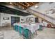 Well-appointed common area featuring tables, chairs, and a staircase, ideal for meetings and community events at 111 Medford St, Summerville, SC 29486