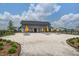 Outdoor gathering space with picnic tables, yellow umbrellas, and gravel ground for community social events at 111 Medford St, Summerville, SC 29486