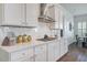 Bright kitchen featuring white cabinets, quartz countertops, stainless steel appliances, and subway tile backsplash at 111 Medford St, Summerville, SC 29486