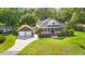 Aerial view of a home featuring a two-car garage, and well-kept landscaping at 1119 Bruton Blvd, Moncks Corner, SC 29461