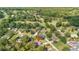 Scenic aerial view of a suburban neighborhood with lush greenery and a nearby golf course, highlighting a serene living environment at 1119 Bruton Blvd, Moncks Corner, SC 29461