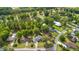 Scenic aerial view showing the home in a tree-lined neighborhood near a golf course at 1119 Bruton Blvd, Moncks Corner, SC 29461