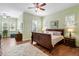 A bright bedroom with wooden flooring, neutral walls, and lots of natural light at 1119 Bruton Blvd, Moncks Corner, SC 29461