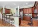 An open kitchen with an eat-in bar, stainless steel appliances, and ample cabinet space at 1119 Bruton Blvd, Moncks Corner, SC 29461