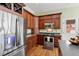 Kitchen with stainless steel appliances, solid countertops, and dark wood cabinetry at 1119 Bruton Blvd, Moncks Corner, SC 29461