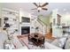 Cozy living room boasts built-in bookshelves, a fireplace, and comfortable seating at 1119 Bruton Blvd, Moncks Corner, SC 29461