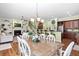 Bright and airy living space showcases a seamless flow between dining, living, and kitchen areas at 1119 Bruton Blvd, Moncks Corner, SC 29461