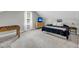 Bedroom with carpet features a bed, natural light, foosball table, and neutral walls at 119 White Picket Ln, Summerville, SC 29483