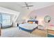 Spacious bedroom features carpeted floors, natural light, a seating area, and vaulted ceilings at 1200 Out Of Bounds Dr, Summerville, SC 29485