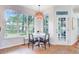 Cozy breakfast nook with large windows and charming pendant light fixture at 1200 Out Of Bounds Dr, Summerville, SC 29485