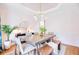 Charming dining room with decorative chandelier, large table and cozy chairs at 1200 Out Of Bounds Dr, Summerville, SC 29485