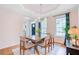 Charming dining room with decorative chandelier, large table, chairs, and bench at 1200 Out Of Bounds Dr, Summerville, SC 29485