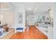 Bright foyer with hardwood floors and open access to the living room and dining area at 1200 Out Of Bounds Dr, Summerville, SC 29485
