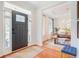 Inviting foyer with a view of the dining room, offering a warm welcome with its neutral decor at 1200 Out Of Bounds Dr, Summerville, SC 29485