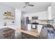 Bright kitchen boasts white cabinets, granite countertops, and stainless appliances at 1200 Out Of Bounds Dr, Summerville, SC 29485