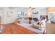 Bright living room features a fireplace, ceiling fan, and hardwood floors at 1200 Out Of Bounds Dr, Summerville, SC 29485