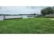 Scenic waterfront view with a dock, pier and small waterfront park area for residents to enjoy at 1207 Albert Storm Ave, Moncks Corner, SC 29461