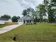 New home with garage and front porch and manicured lawn at 1207 Albert Storm Ave, Moncks Corner, SC 29461
