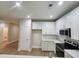 Beautiful kitchen offering ample counter space, modern appliances and warm wood laminate flooring at 1207 Albert Storm Ave, Moncks Corner, SC 29461