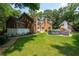 Expansive backyard with well-maintained lawn and an above ground pool, perfect for entertaining and relaxation at 125 Drayton Dr, Summerville, SC 29483