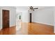 A bright bedroom with hardwood flooring, white walls, and large windows at 125 Drayton Dr, Summerville, SC 29483
