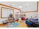 Bedroom with a bunk bed, dollhouse, and fun decor for a imaginative play at 125 Drayton Dr, Summerville, SC 29483