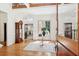 Elegant foyer with hardwood floors, a grandfather clock, and abundant natural light at 125 Drayton Dr, Summerville, SC 29483