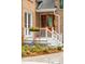 Charming front porch adorned with flowers and a classic wood door at 125 Drayton Dr, Summerville, SC 29483
