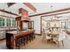 Well-equipped kitchen with granite island and seamlessly flows into dining and living spaces at 125 Drayton Dr, Summerville, SC 29483