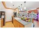 Unique kitchen featuring wood accents, granite countertops, pendant lights, and a breakfast bar at 125 Drayton Dr, Summerville, SC 29483