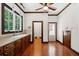 Bright laundry room with window over sink and access to additional rooms at 125 Drayton Dr, Summerville, SC 29483