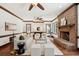 Inviting living room with a brick fireplace and hardwood flooring at 125 Drayton Dr, Summerville, SC 29483