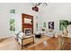 Spacious living room with fireplace, high ceiling, and abundant natural light at 125 Drayton Dr, Summerville, SC 29483