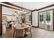 Bright open floor plan with fireplace, beamed ceilings and access to the outdoors at 125 Drayton Dr, Summerville, SC 29483