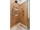 Modern shower featuring dual shower heads, stylish tile surround, and built-in shelving at 125 Drayton Dr, Summerville, SC 29483