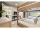 Spacious bedroom with custom bunk beds, stylish rug and convenient adjacent bathroom at 127 Blue Heron Pond Rd # C, Kiawah Island, SC 29455
