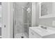 Bright bathroom featuring a glass shower with tiled walls and a white vanity at 127 Roberts Rd, Summerville, SC 29483