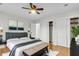 Spacious bedroom featuring hardwood floors, ceiling fan, closet and stylish decor at 127 Roberts Rd, Summerville, SC 29483