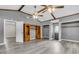 Expansive bedroom with high ceilings, two fans, hardwood floors, and abundant natural light from large windows at 127 Roberts Rd, Summerville, SC 29483