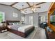 Bedroom featuring stylish decor, hardwood floors, ceiling fan, and abundant natural light from large windows at 127 Roberts Rd, Summerville, SC 29483
