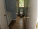 Clean bathroom with essential fixtures, modern vanity, and a window for natural lighting at 1277 Russellville Rd, Saint Stephen, SC 29479