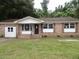 Charming brick single-story home with a well-maintained front yard and inviting entrance at 1277 Russellville Rd, Saint Stephen, SC 29479