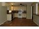 Functional kitchen with classic cabinetry, appliances, and a breakfast bar, perfect for casual dining at 1277 Russellville Rd, Saint Stephen, SC 29479