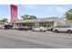An inviting exterior featuring vibrant local businesses along a bustling city street at 1391 Fairfield Ave, Charleston, SC 29407